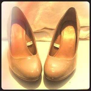 Nude patent heels